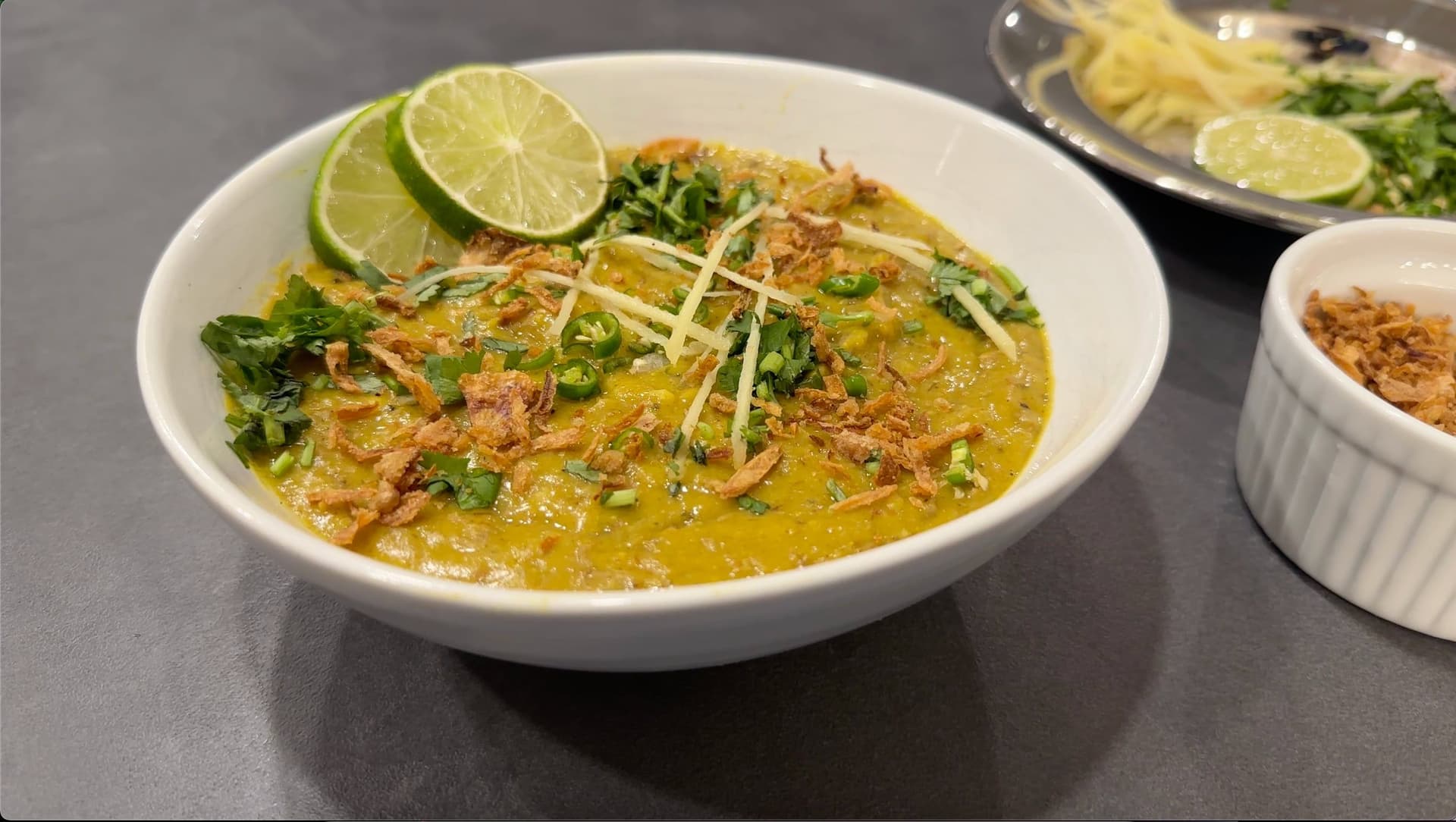 Bowl of Haleem to demonstrate braised meat technique